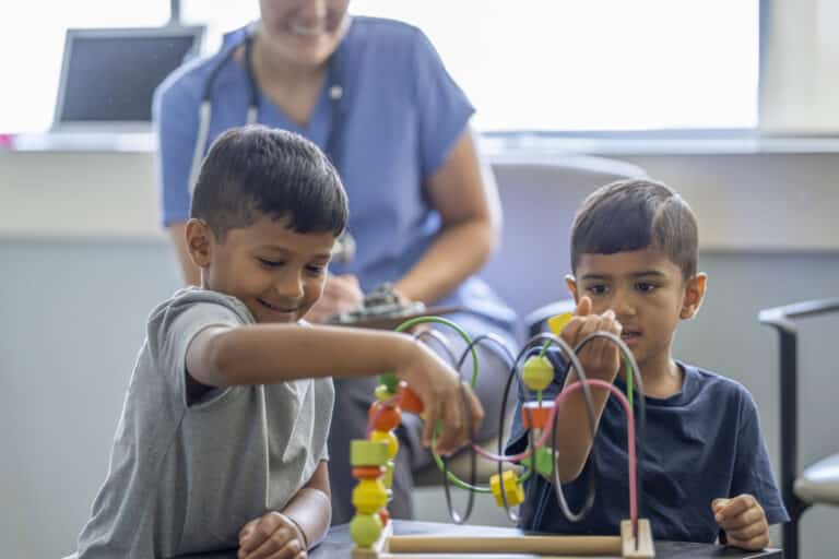 Neuropsychology tests by two boys in a waiting room