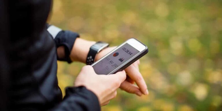Woman using tech during fitness workout