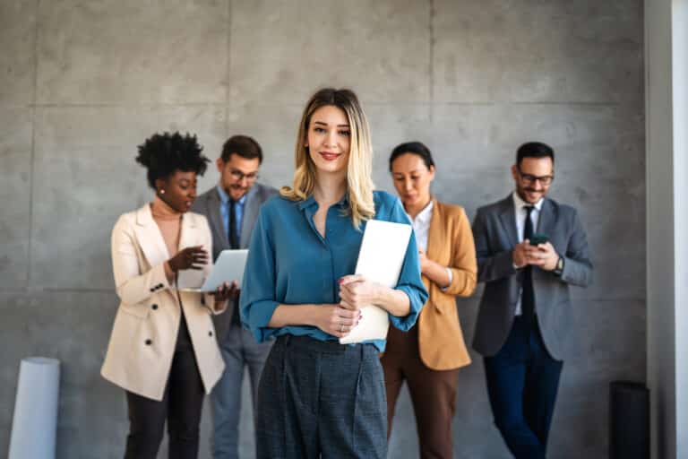 Successful multiethnic team achieving goals in a psychologically safe corporate office