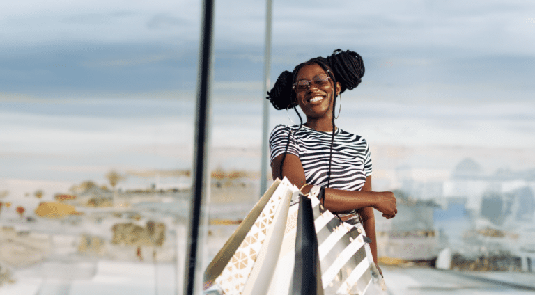 Women smiling while implementing conscious consumerism into daily decisions