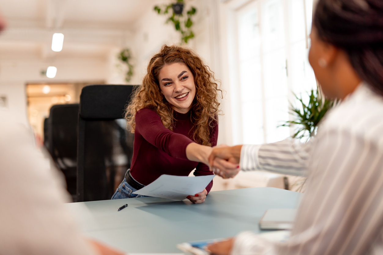 Young woman entering an interview with durable skills on her CV
