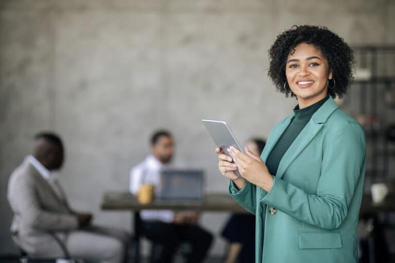 Young business women using emotional intelligence in leadership to carry her team to success