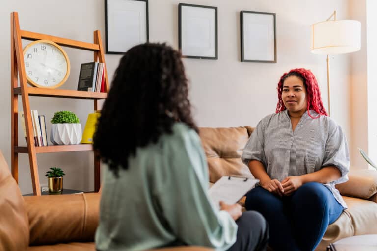 Psychologist in a counselling session with a gender-based violence survivor