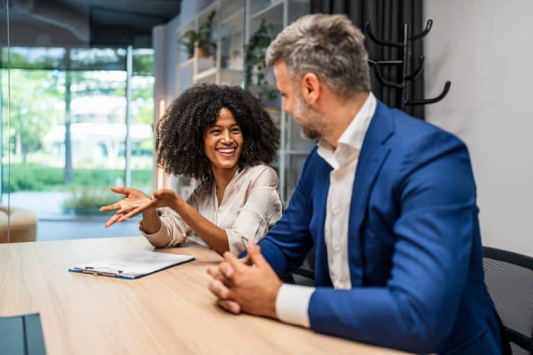 Female business coach in a one on one session with a business leader