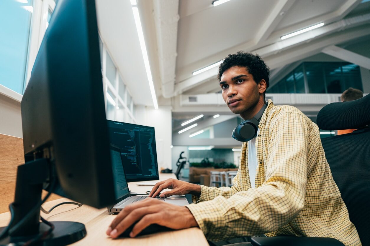 Young man going working online as a digital citizen