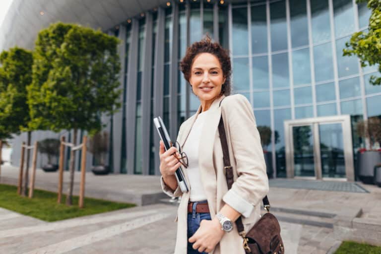 Young, smiling businesswoman who understands why emotional intelligence matters