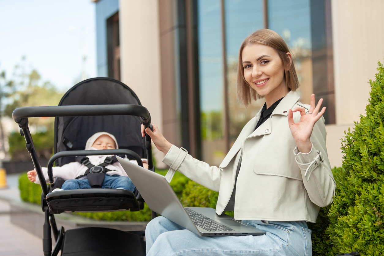 Businesswoman working after maternity leave